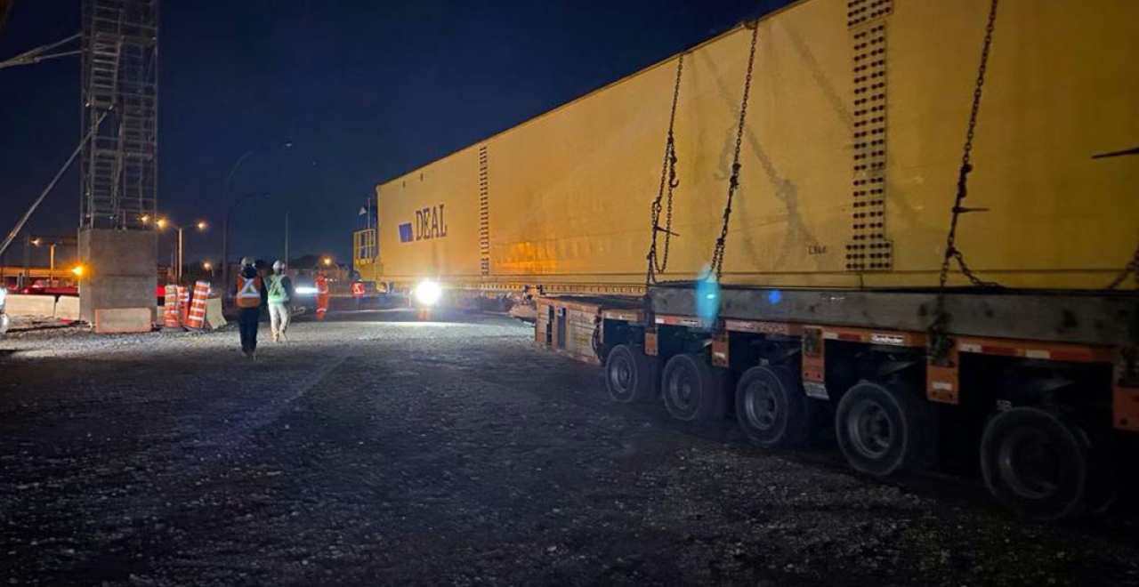 The use of high-capacity chains and slings to secure each of the beams to the transporter ensured the safety of the operation throughout the move.